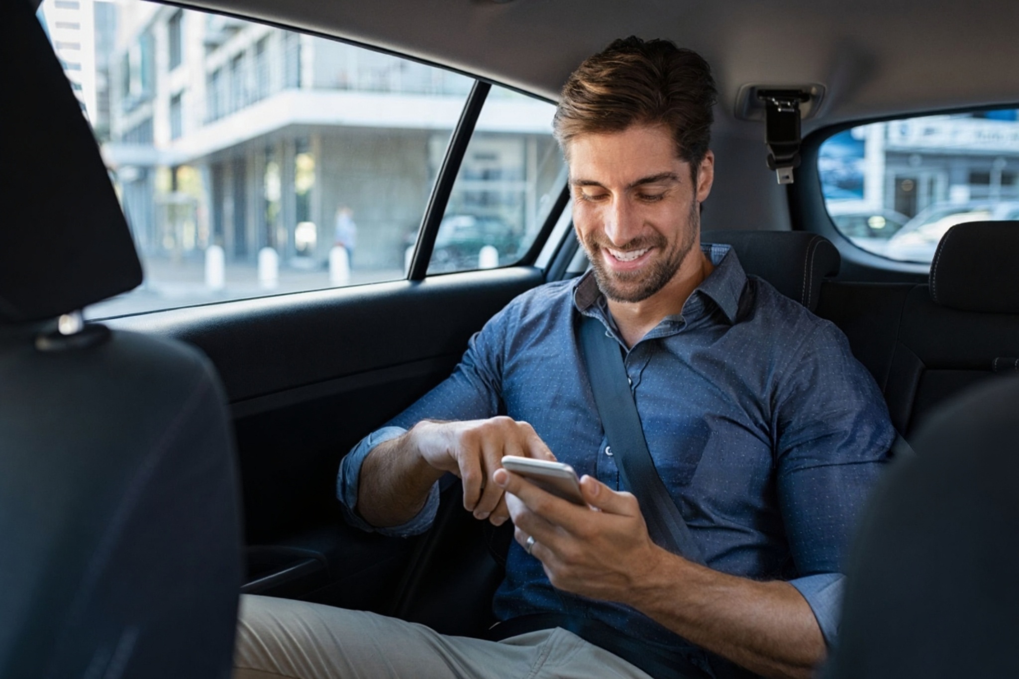 Happy passenger in Qglide Taxi